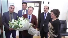 BAŞKAN ÖZDOĞAN ÇİÇEKLERLE KARŞILANDI